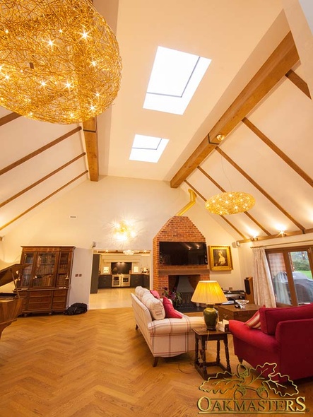 Steel roof structure with ceiling lanterns disguised with stunning oak covers