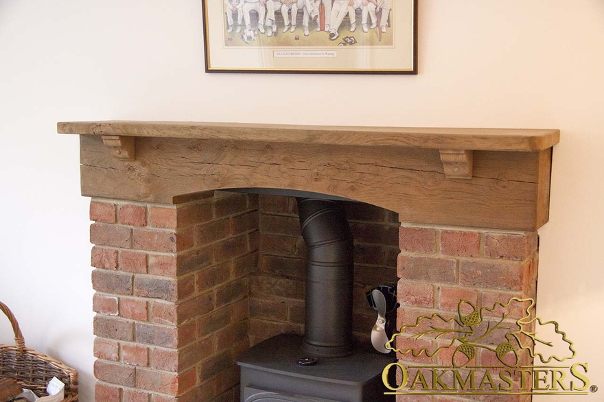 Oak fireplace detail with mantle shelf and corbels