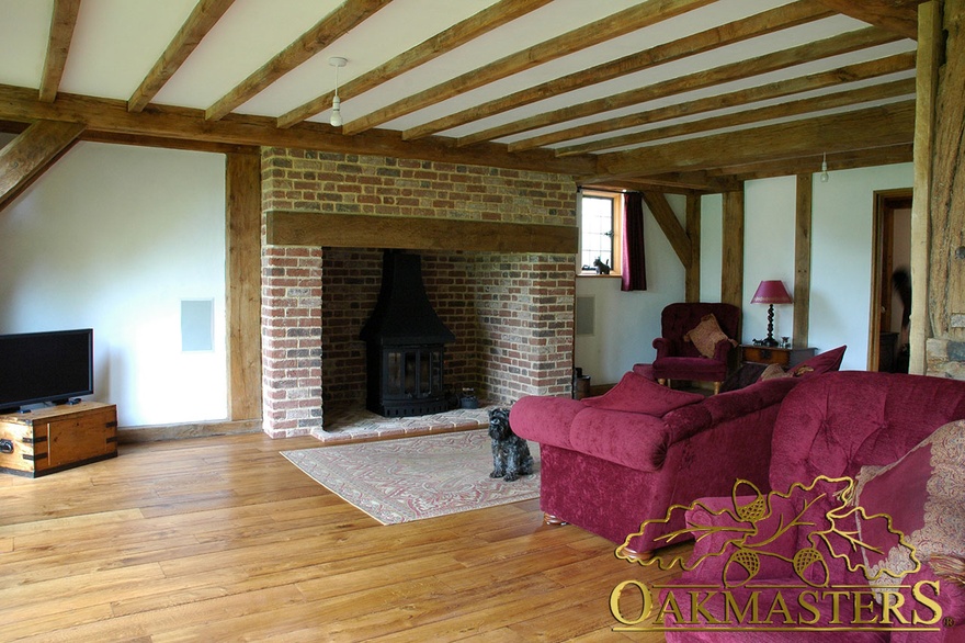 Brick and oak fireplace in a cottage style house extension