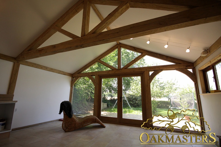 View out of a garden room attached to a two bay oak garage