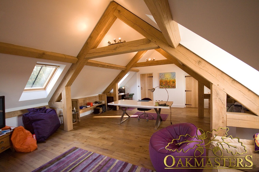 Raise tie trusses allow for this loft office space above an oak framed garage