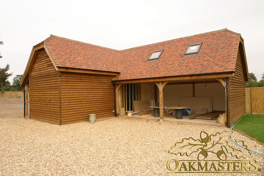 Oak framed L shaped garage and outbuilding complex