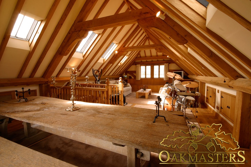 Raised collar trusses create comfortable loft space above this 3 bay oak garage