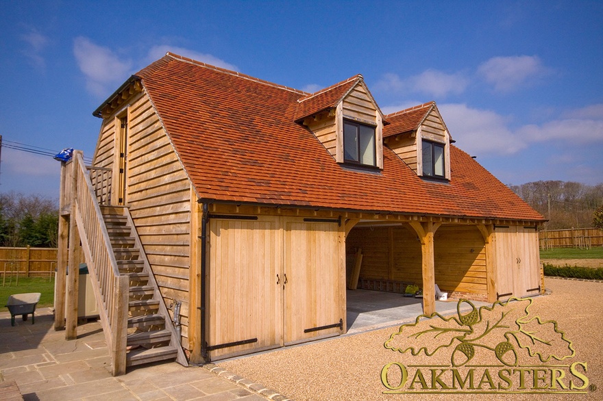 Four bay oak framed garage with oak side staircase