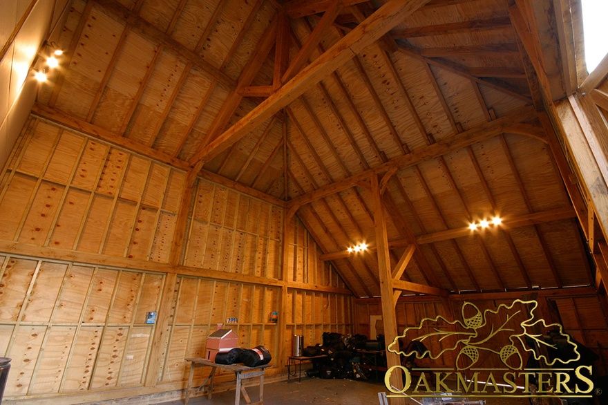 Internal view of oak barn roof with raised tie trusses
