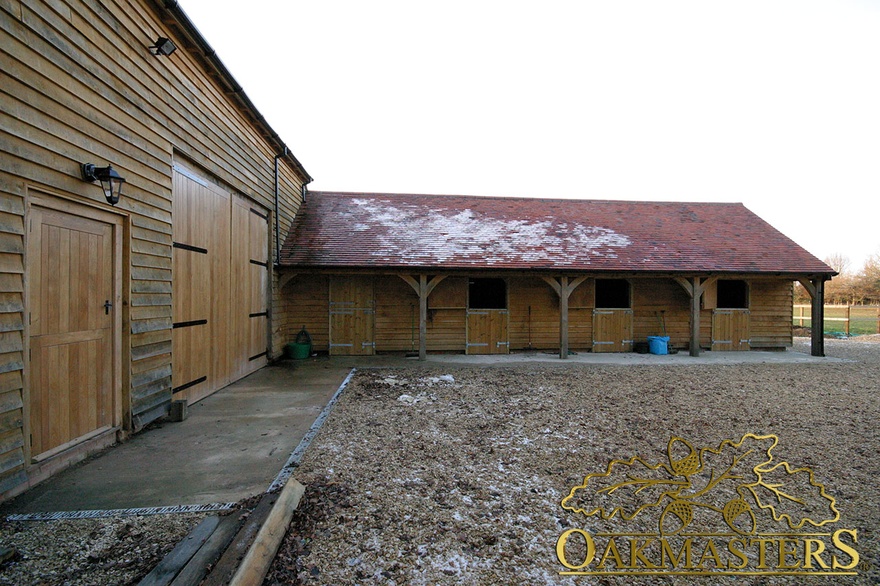 Oak barn and stables with tiled roof