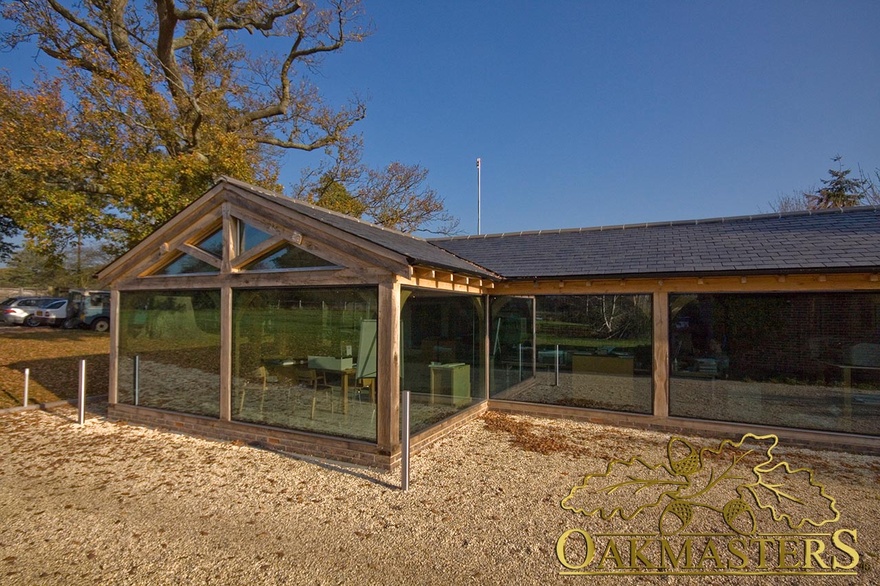 Glazed oak framed office space with low roof