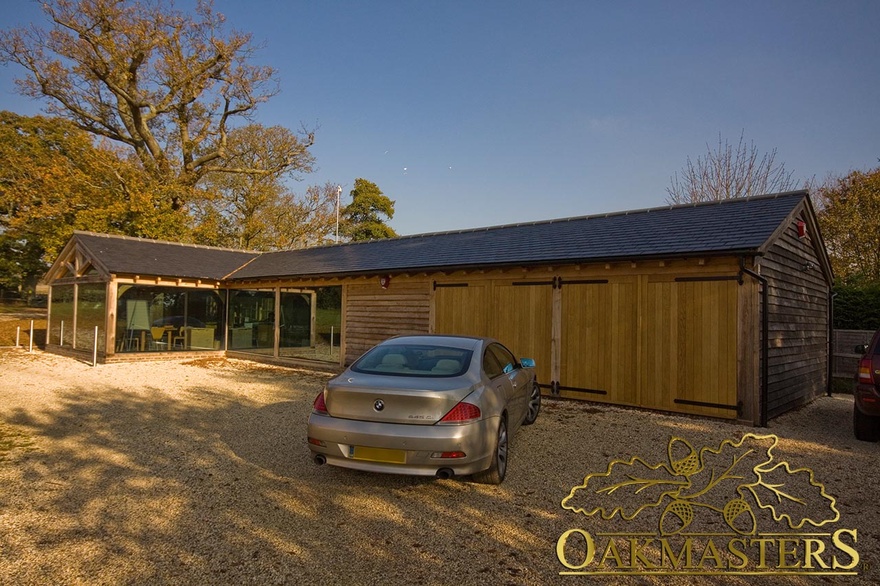 L shaped oak garage and glazed office complex