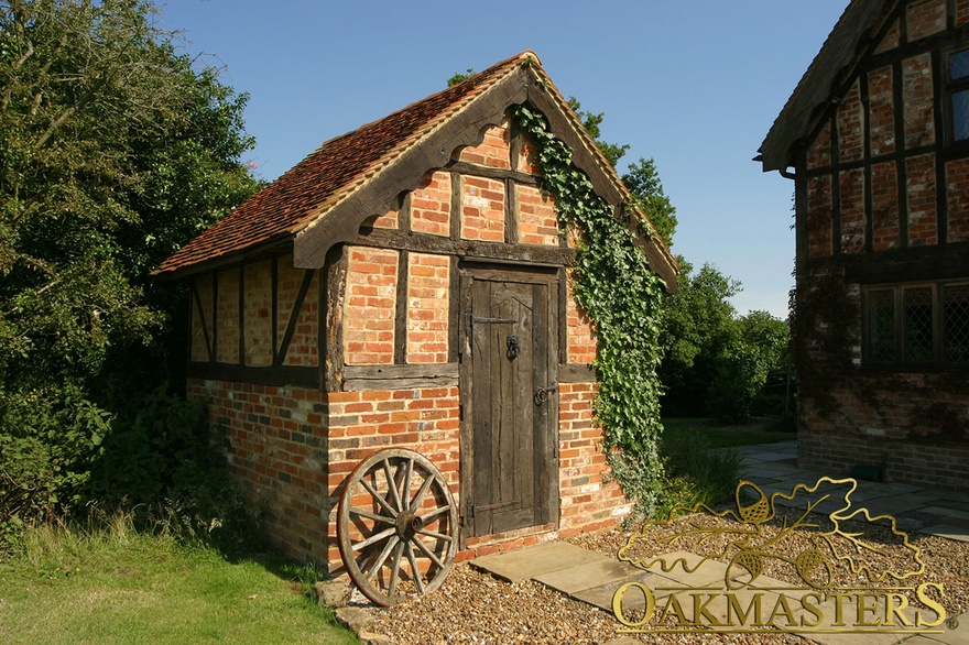 Reclaimed wood timber and brick storehouse outbuilding