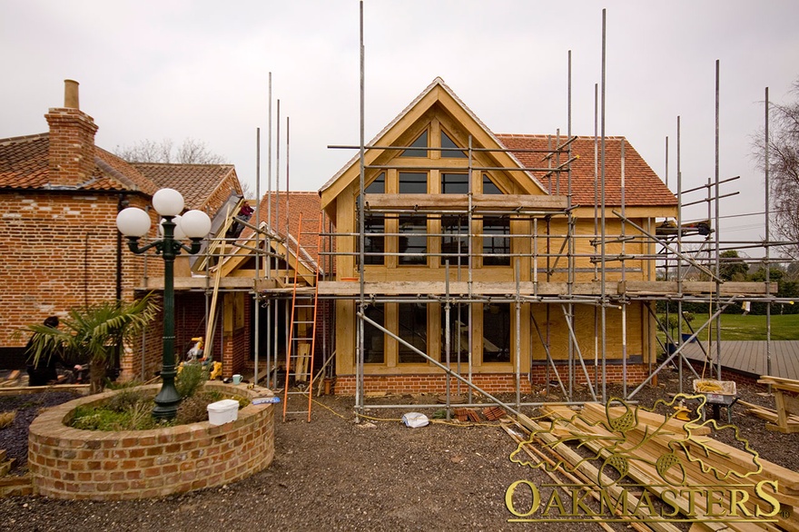 Large oak frame house extension under construction