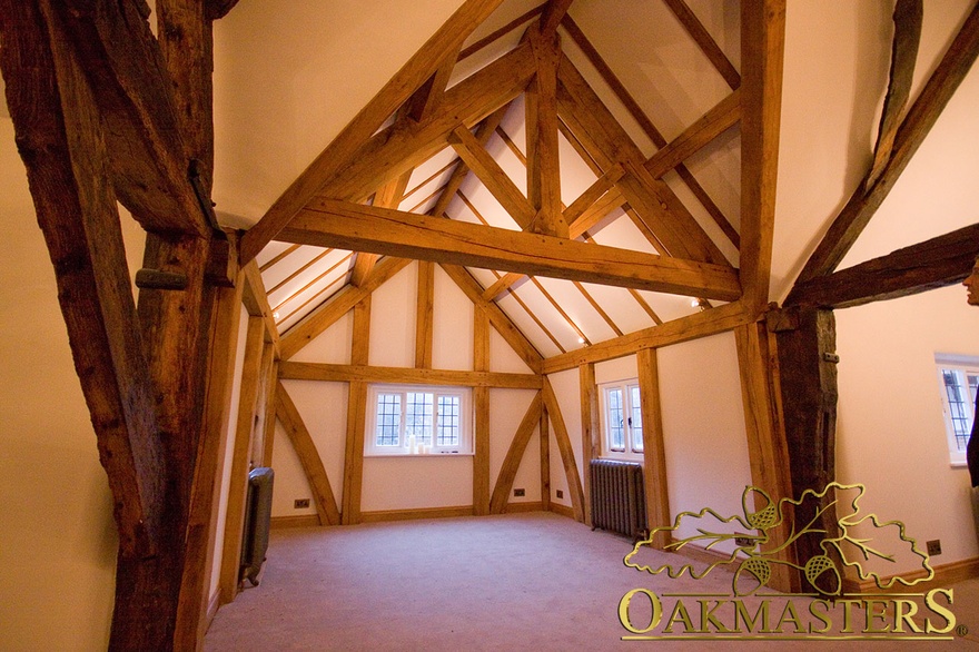 Bespoke king post truss and beams in listed house