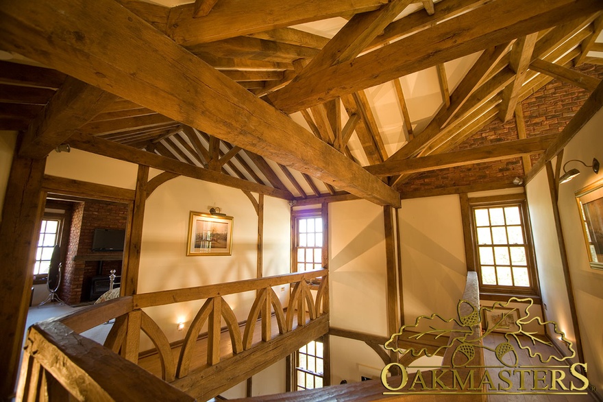 Exposed hand crafted ceiling beams and rafters in Isle of Man hallway