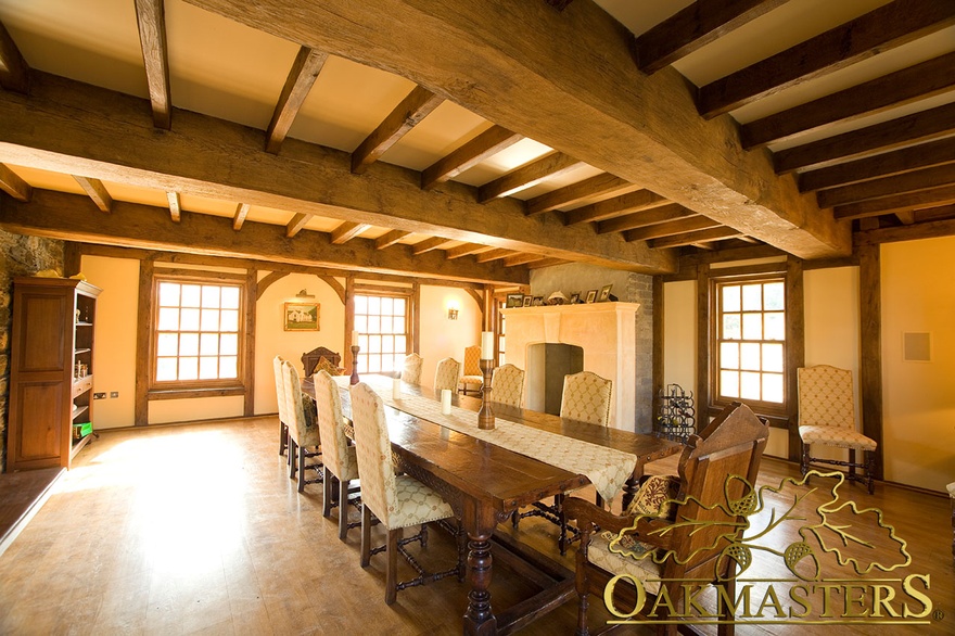 Large hand crafted oak ceiling beams and rafters in Isle of Man manx oak dining-room