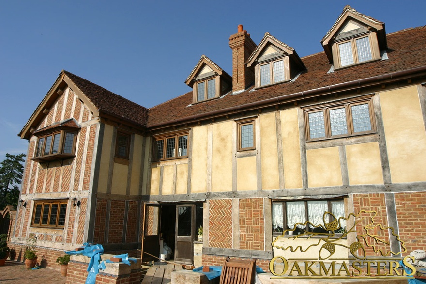 Tudor style new build home in brick and exposed oak cladding