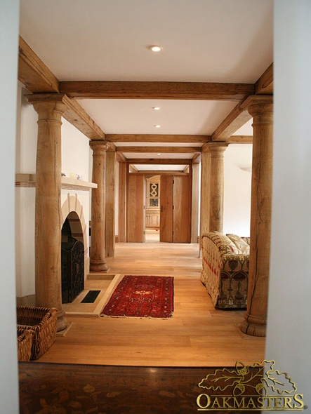 Bespoke oak columns and exposed beams in unusual country house