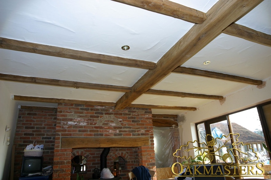 Go for smaller beams and sparser joists if your ceiling is low - 152925