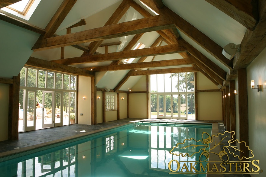 Oak pool building with raised tie trusses