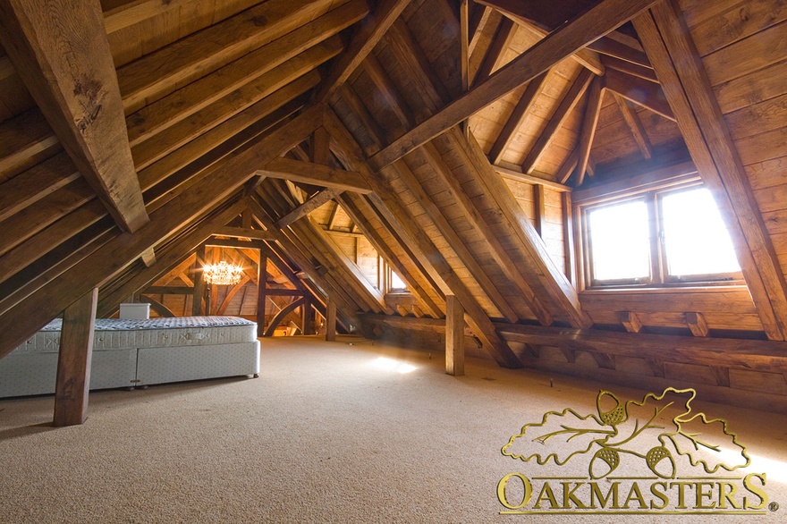 Cavernous loft bedroom with a stunning exposed oak roof