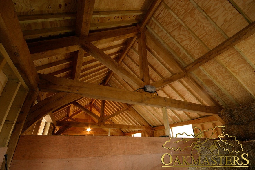 Open ceiling with exposed trusses during construction