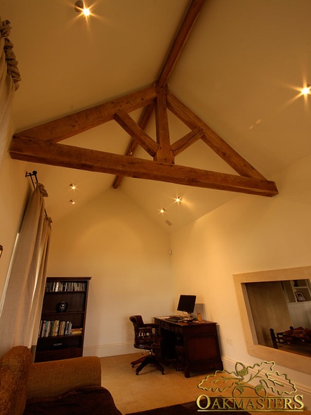 Small exposed king post truss in office space