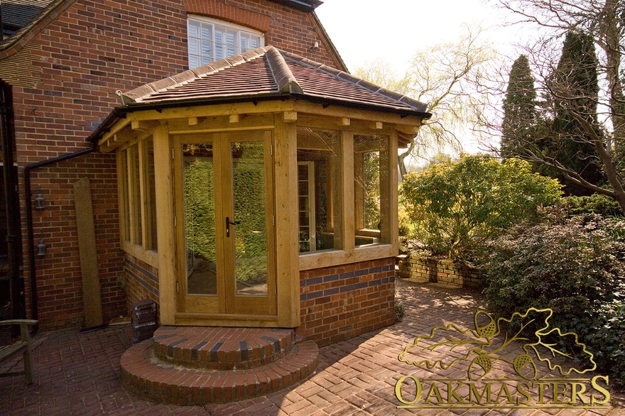 Hexagonal glazed oak-frame garden room