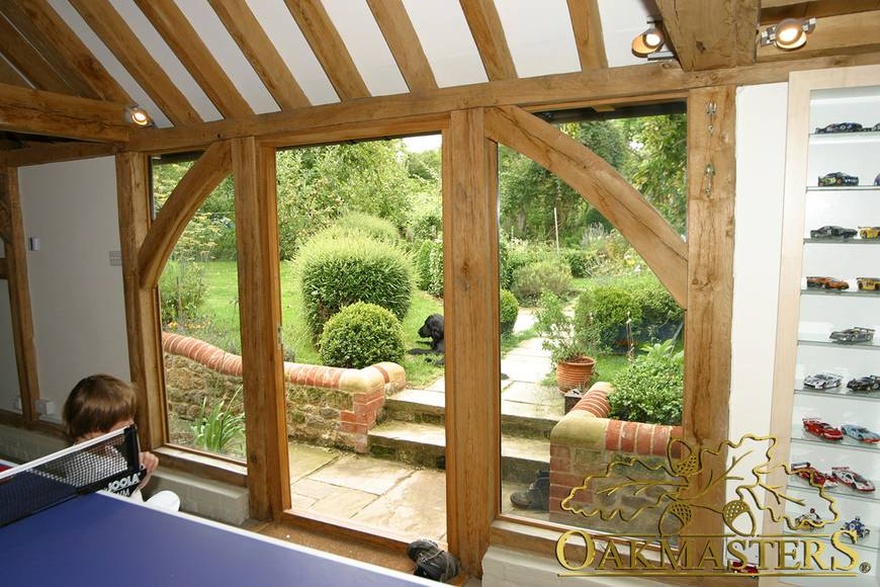 View out to a lovely garden through a glazed oak door