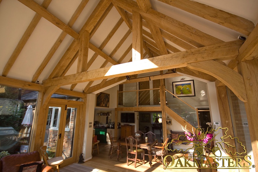 Handcrafted oak truss exposed rafters and oak staircase in garden room 