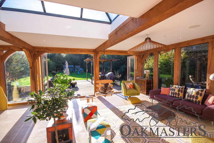 Oak beam supporting a flat ceiling in this orangery style extension