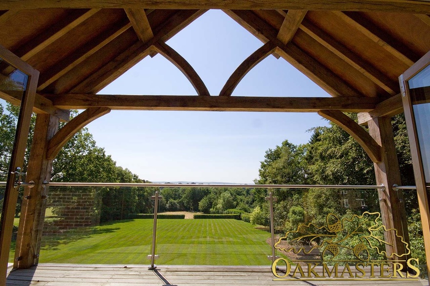 Glorious view out of the master bedroom through the oak truss