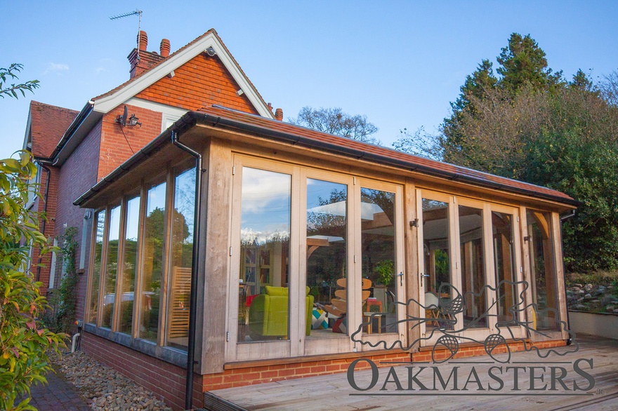 Oak framed extension uses encapsulated glazing system