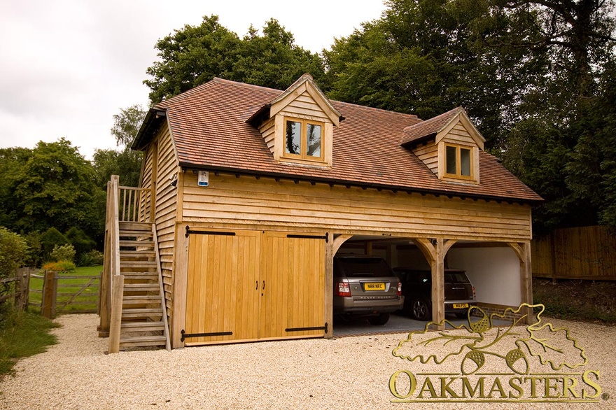 This three bay oak garage features 2 open and 1 closed bay 