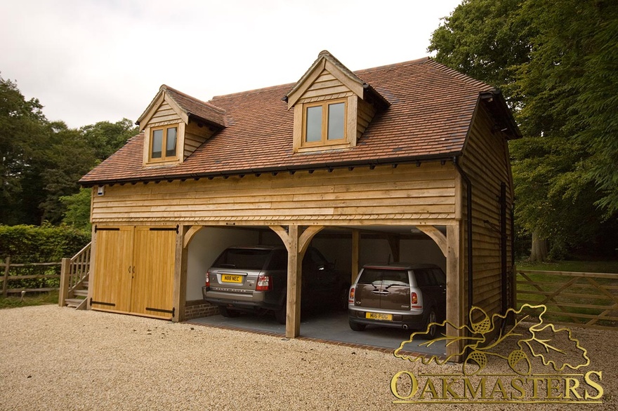 Oak dormers above the oak framed garage allow for extra space in the office upstairs