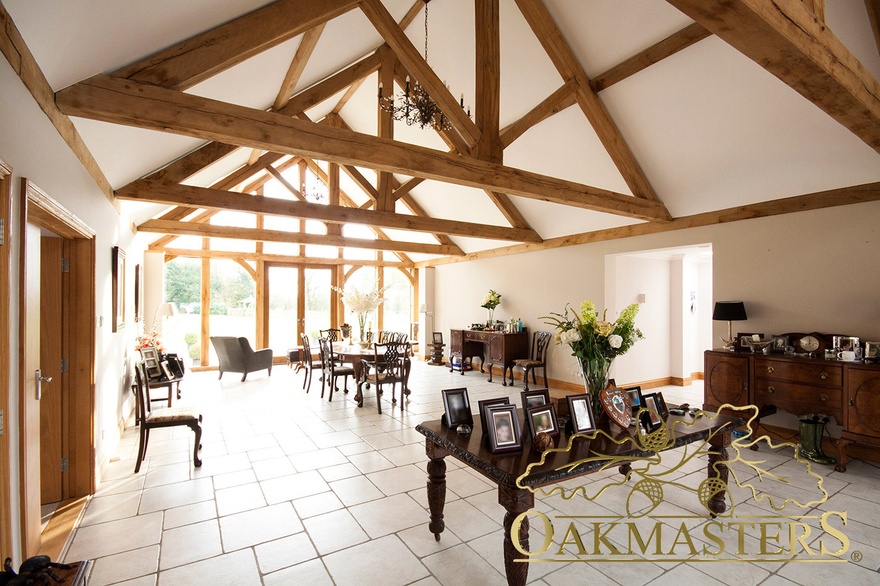 Succession of four oak trusses creates a lovely effect