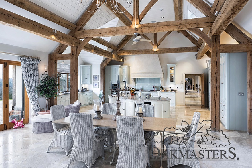 Manor house dining area with open vaulted oak roof