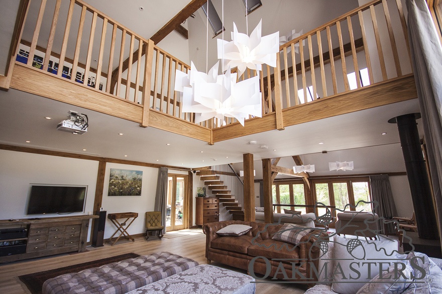 Living space with oak vaulted ceiling and stunning gallery landing