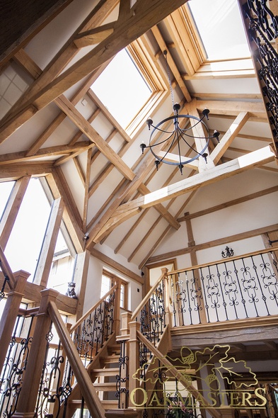 View up the stairwell into the stunning vaulted oak roof above the hallway