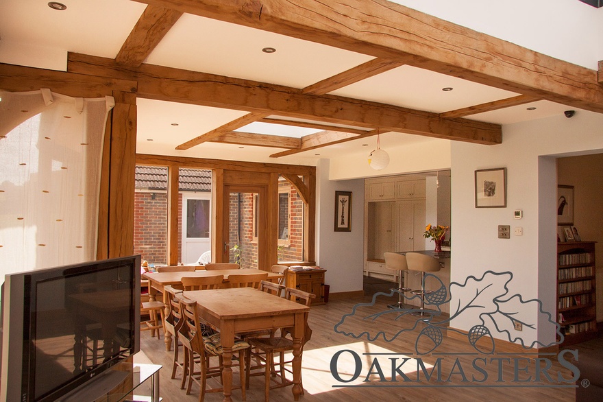 The oak extension is linked to the main house by a large opening into the kitchen
