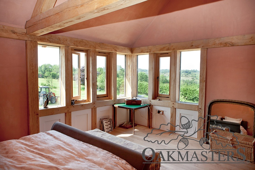 View out of the master bedroom trough the oak wrap around window