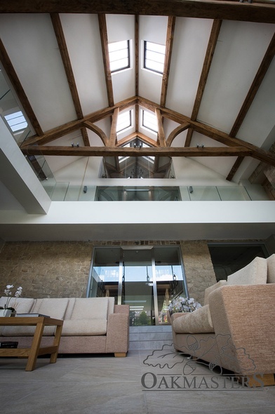 Looking up from the swimming pool, you get a stunning view of the vaulted oak roof