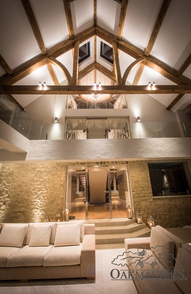 Looking from the swimming pool back to the leisure and accommodation area, with oak trusses