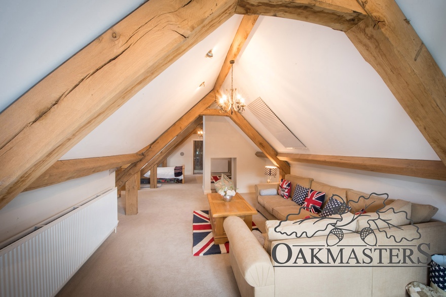 The oak roof structures seamlessly connect individual areas of guest accommodation