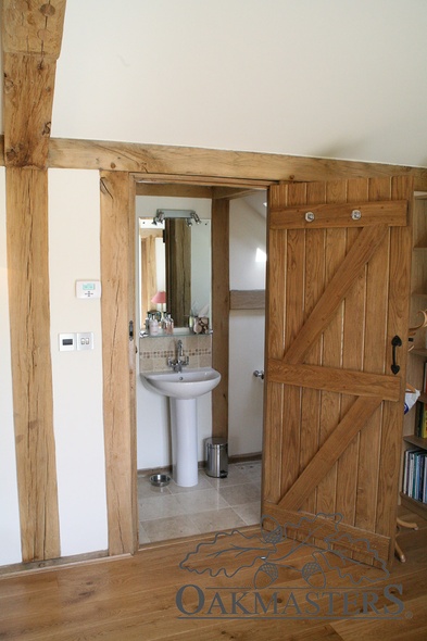 Exposed oak frame features throughout the interior