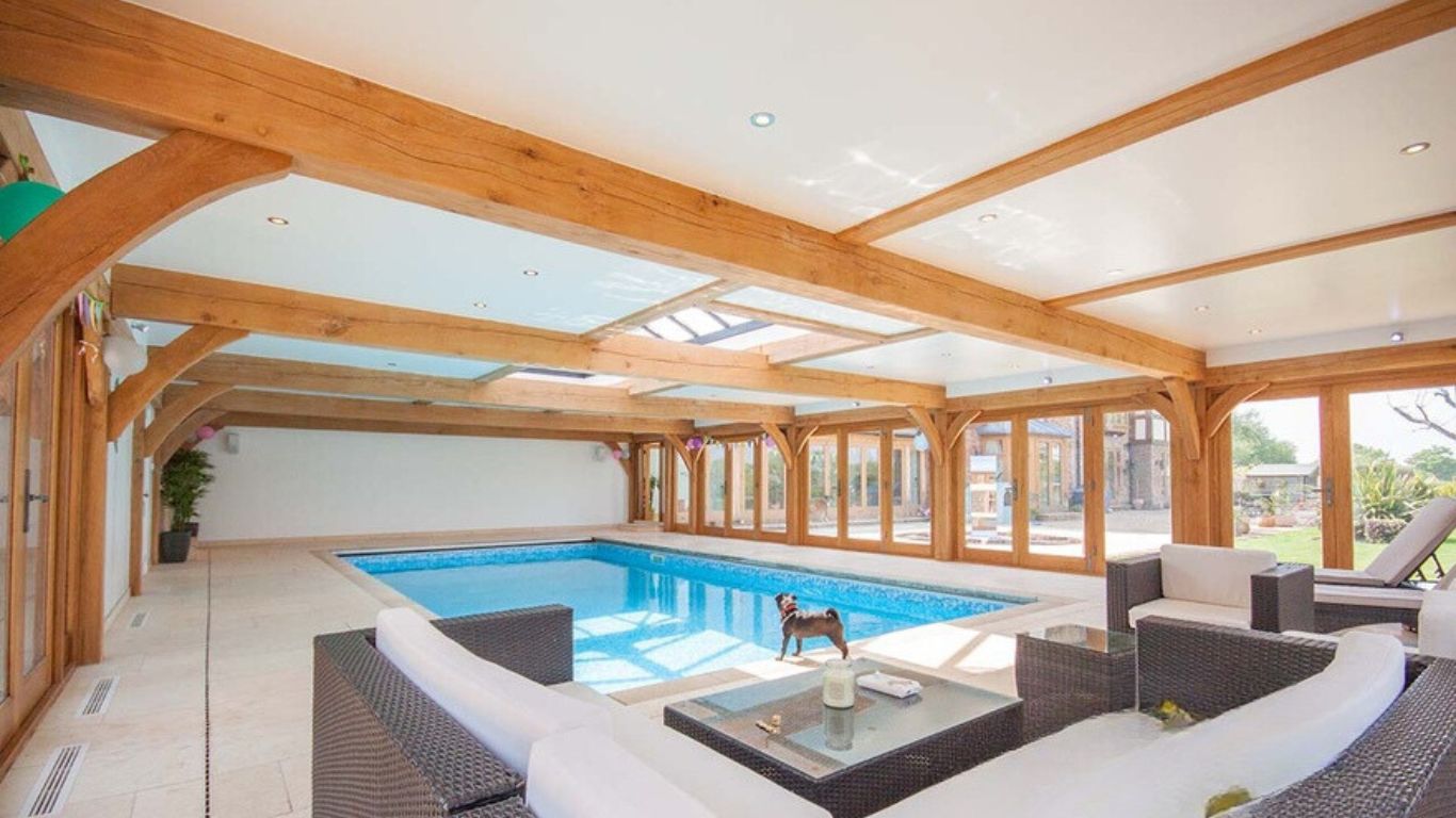Our low height oak pool building, perfect for leisure and relaxation. Crafted with precision, our oak framed swimming pool blends seamlessly with your surroundings.