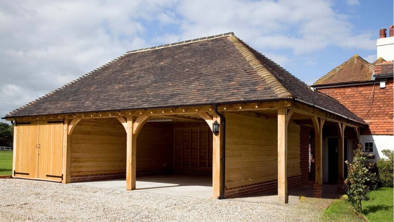 Oak framed garage, a testament to craftsmanship and quality. Our oak garage kits for bespoke timber framed garage solutions.