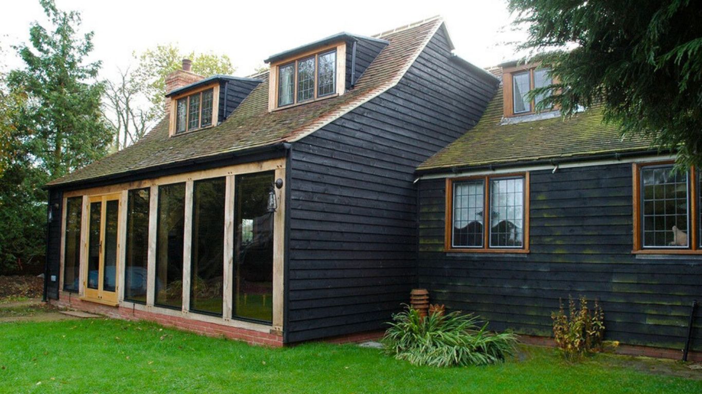 Oak framed extension adds value to a property with its natural wooden charm.