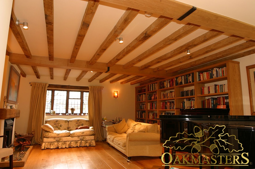 Long steel beam covered with oak beam casing