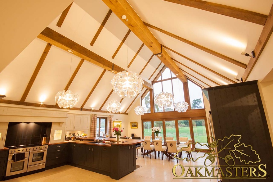 Three sided oak beam covers in a stunning contemporary kitchen diner