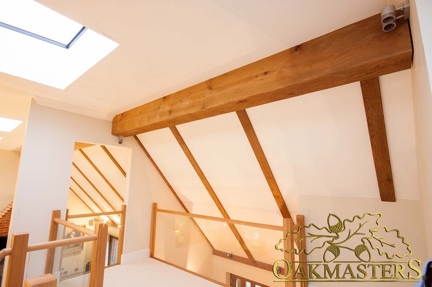 L shaped beam cover detail with oak rafters