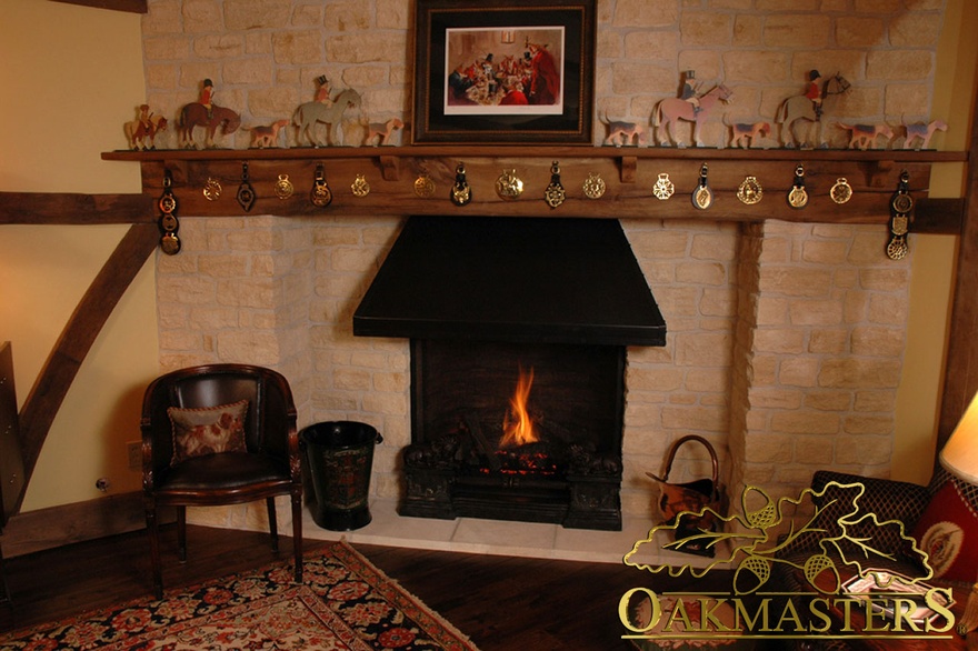 Traditional wood burning stove with an oak fireplace beam