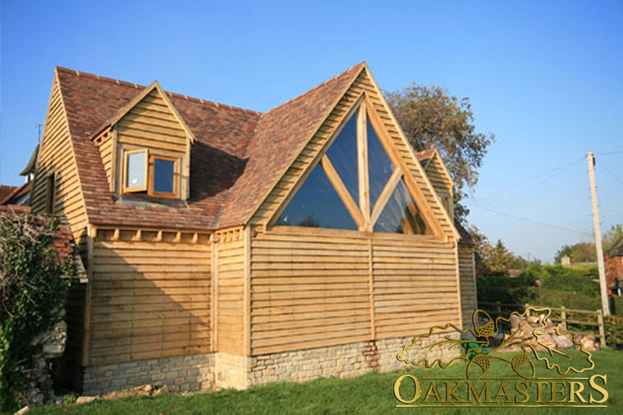 Glazed gable detail with king post truss